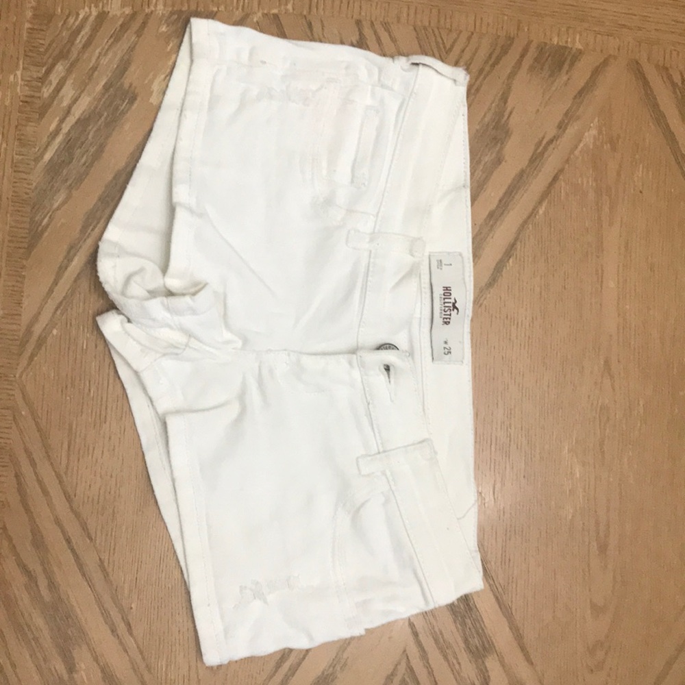 Distressed white short shorts